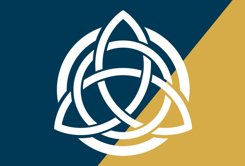 The white triquetra symbol that is the Iona Collaborative's logo on a split background of navy blue and gold,